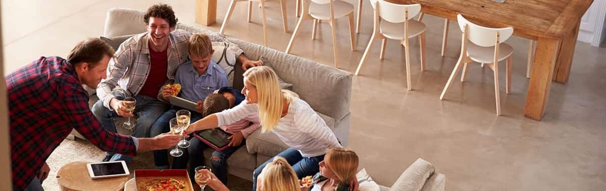 Family Enjoying Pizza With Great Indoor Air Quality